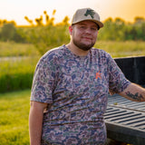 Douglas the owner wearing our ultra camo shirt